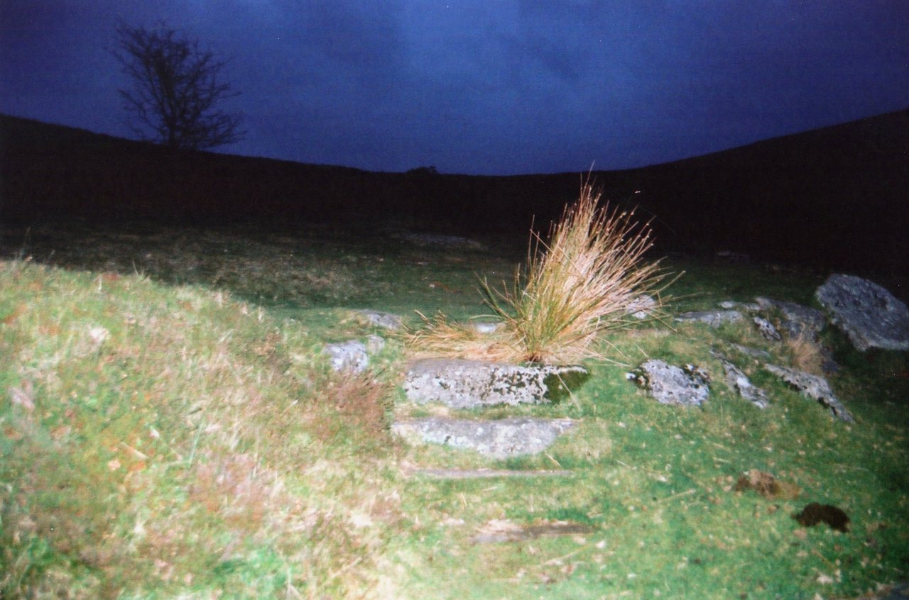 A and M at Celtic ruin at night